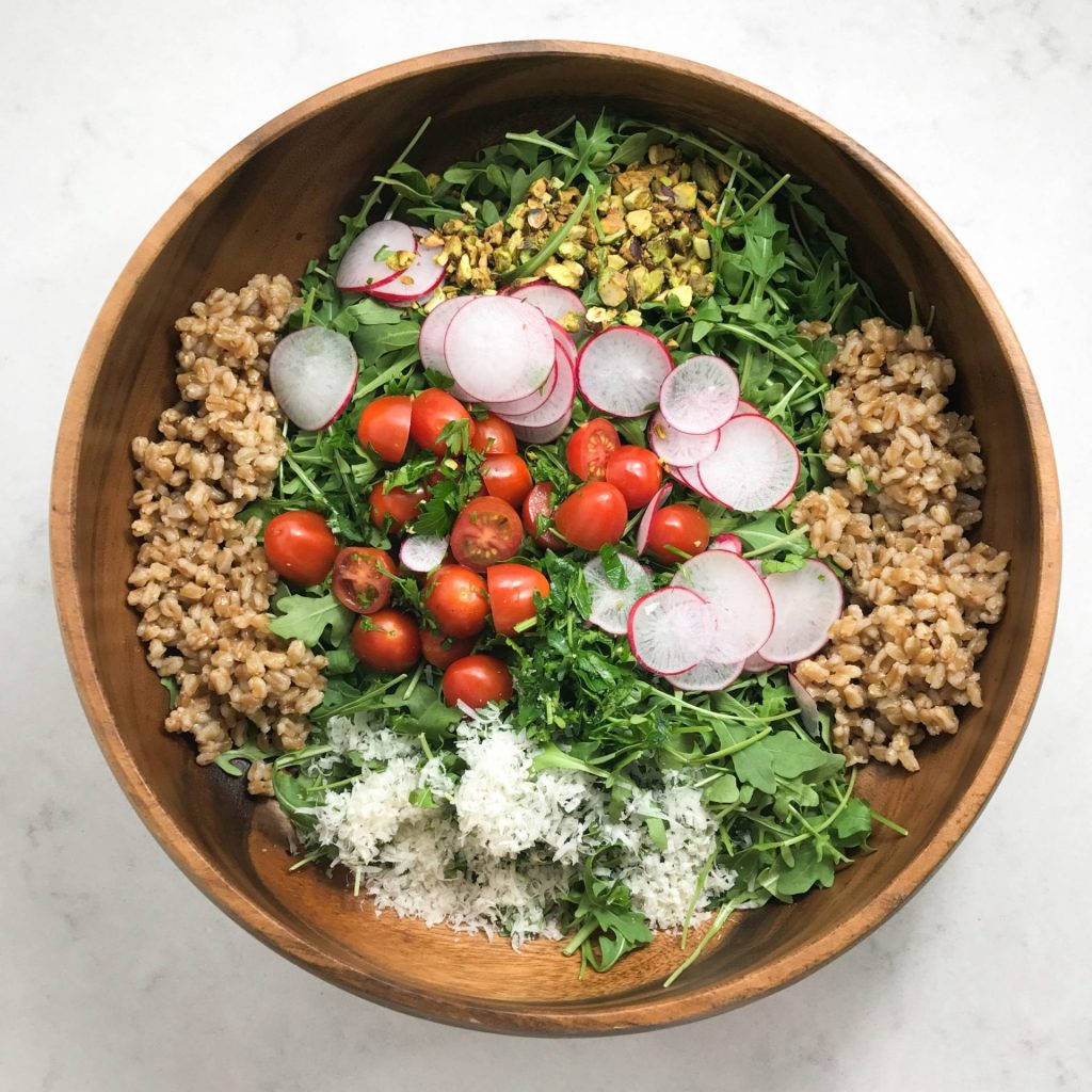 quinoa mixed salads in a wooden bowl
