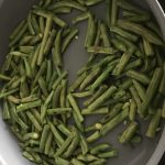 stir fried beans in a pan