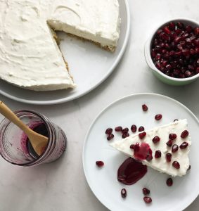 greek yogurt cheesecake with pomegranate top view