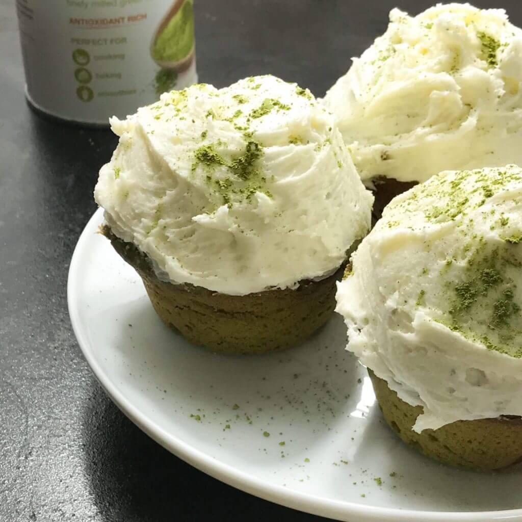 japanese matcha cupcakes with butter cream on top
