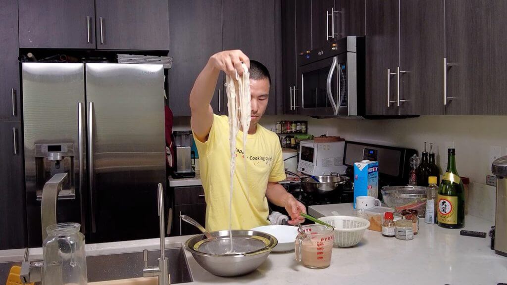patrick straining a noodles
