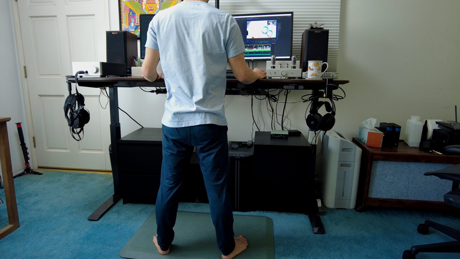 Pat Tokuyama working while standing in his apex desk series 71