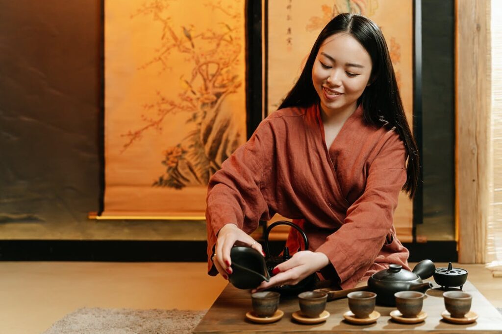 a japanese lady pouring tea