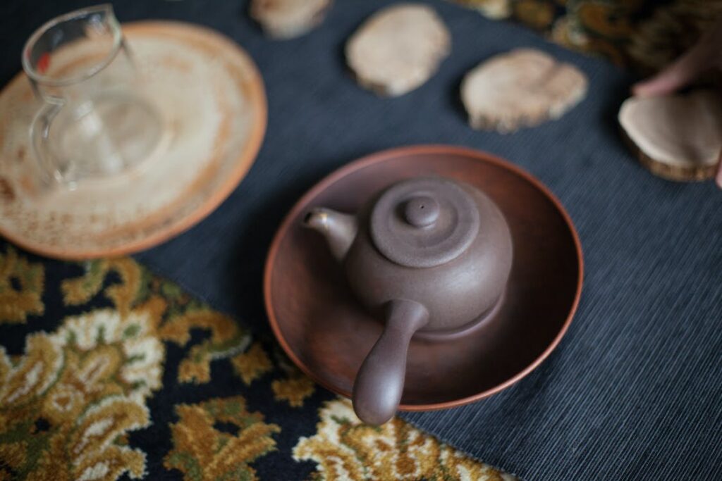 clay tea pot on a tray