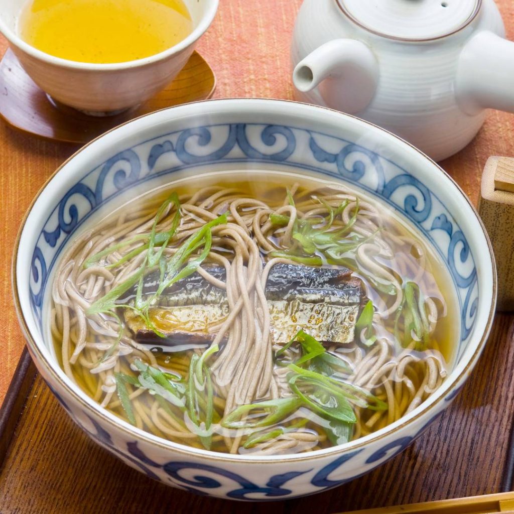 Kyoto-inspired Japanese noodle soup with fish and vegetables.