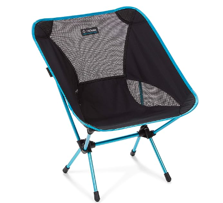 A Helinox Chair One, folding chair with black and blue colors, placed on a white background.