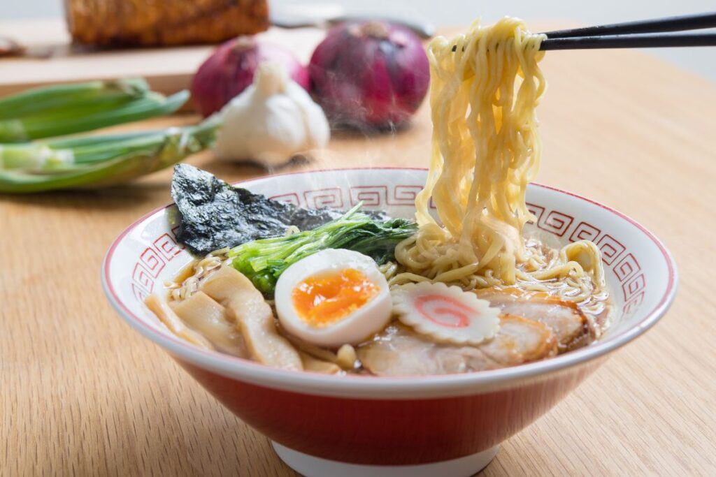 ramen Japanese noodles in bowl with chopsticks