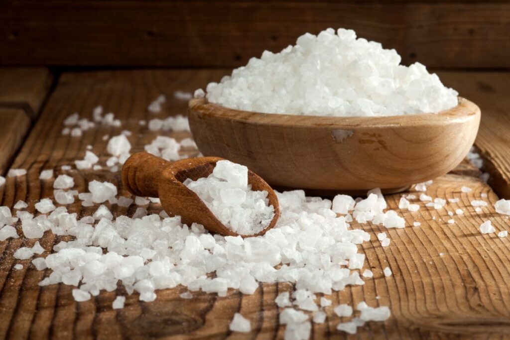 Japanese sea salts in a wooden bowl and spoon 