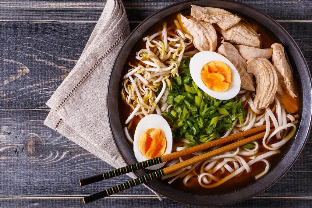 A bowl of ramen with eggs in Japanese ckooking.